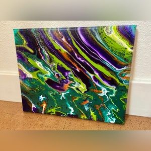 This is a 8x10 acrylic pour painting on stretched canvas.